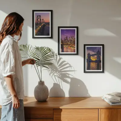 Bilderwand mit Brücken und Stadtansichten im Sonnenuntergang