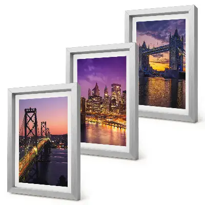 Bilderwand mit Brücken und Stadtansichten im Sonnenuntergang