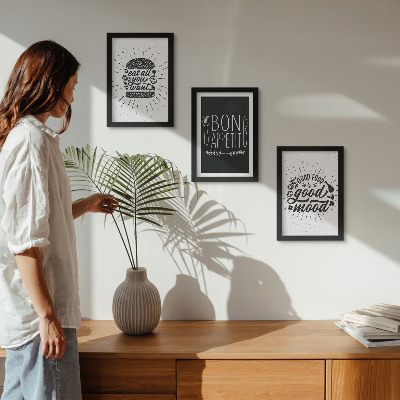 Bilderwand Grafiken mit Slogans rund um Essen und Kulinarik