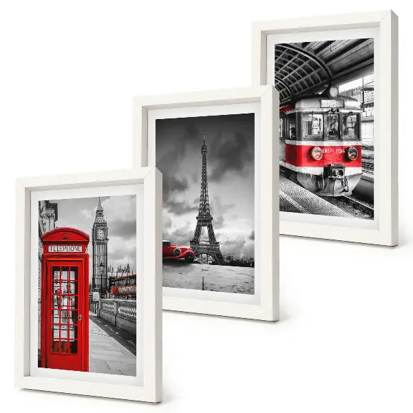 Bilderwand mit Motiven ikonischer Städte wie London und Paris sowie Schienenverkehr