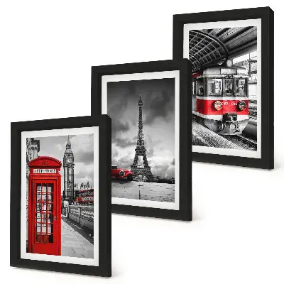 Bilderwand mit Motiven ikonischer Städte wie London und Paris sowie Schienenverkehr