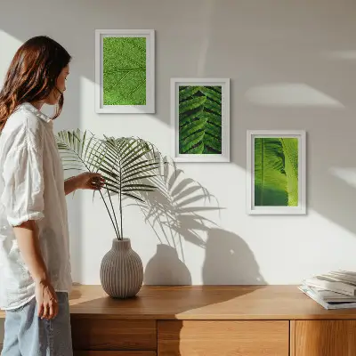 Bilderwand mit Nahaufnahmen von tropischen Blättern