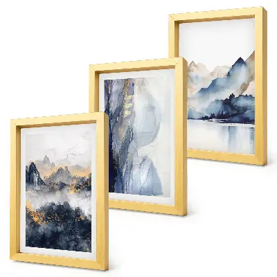 Bilderwand mit Berglandschaften in Blau- und Grautönen