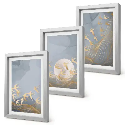 Bilderwand mit dem Motiv Vögel im Flug vor Himmel und Mond