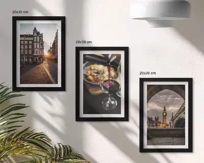 Bilderwand mit einer Stadt, Essen und einer Ansicht von London