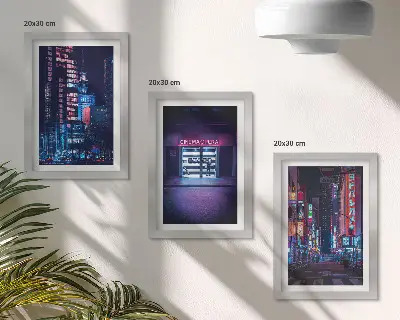 Bilderwand Nachtstadt mit Neonlichtern und Kinoeingang