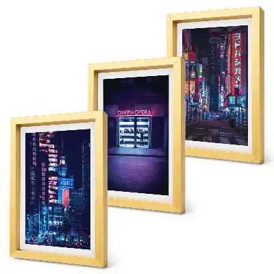 Bilderwand Nachtstadt mit Neonlichtern und Kinoeingang