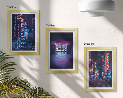 Bilderwand Nachtstadt mit Neonlichtern und einem Kinoeingang