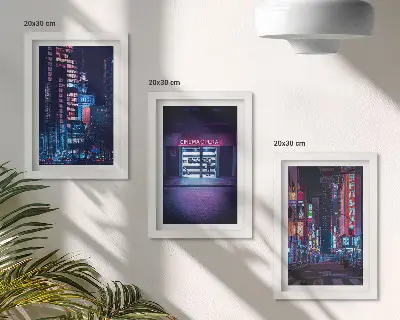 Bilderwand Nachtstadt mit Neonlichtern und Kinoeingang