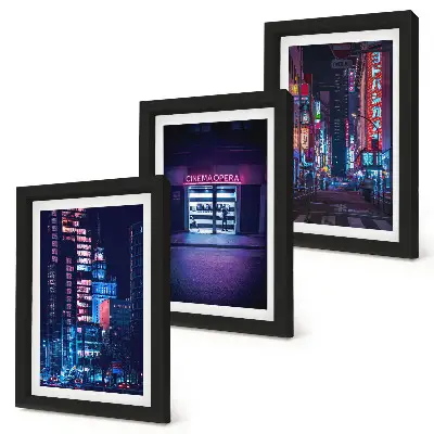 Bilderwand Nachtstadt mit Neonlichtern und Kinoeingang
