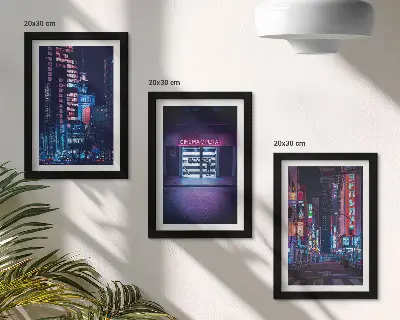 Bilderwand Nachtstadt mit Neonlichtern und Kinoeingang