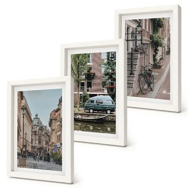 Bilderwand mit ruhigen Stadtansichten von Gebäuden
