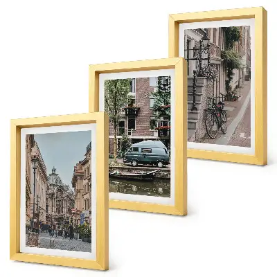 Bilderwand mit ruhigen Stadtansichten von Gebäuden