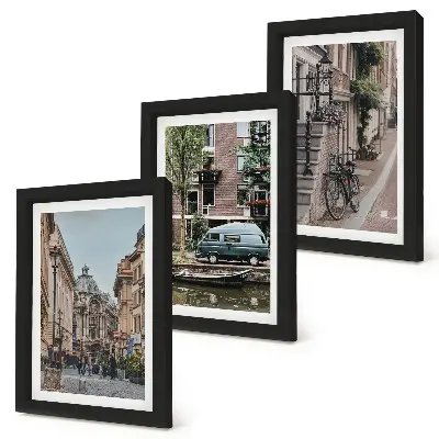 Bilderwand mit ruhigen Stadtansichten von Gebäuden