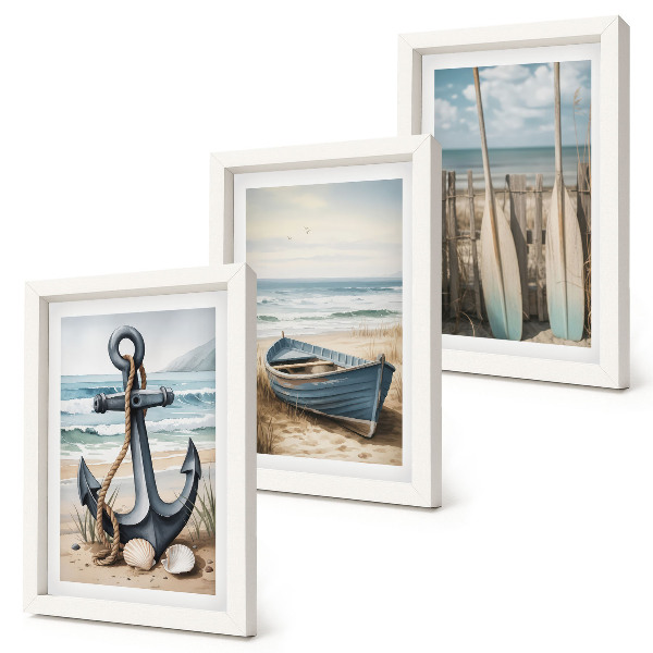 Bilderset mit rahmen Bootsanker und Ruder am Strand mit dem Meer