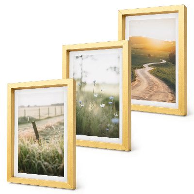 Bilderwand Landschaft mit Wiese, Straße und Sonnenuntergang