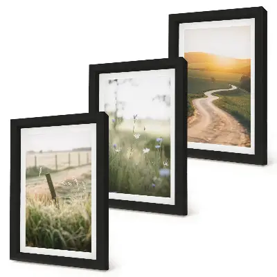 Bilderwand mit Landschaftsmotiv von Wiese, Straße und Sonnenuntergang