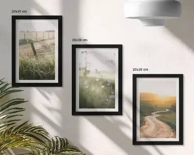 Bilderwand mit Landschaftsmotiv von Wiese, Straße und Sonnenuntergang