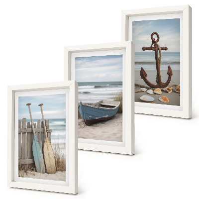 Bilderwand Ein Strand mit einem Ruderboot und einem Anker im Sand