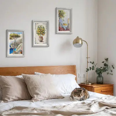 Bilderwand mit Meerblick, Zitronenbaum und Gartentisch