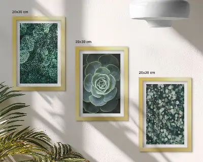 Bilderwand mit grünen Sukkulentenblättern und zarten Zweigen
