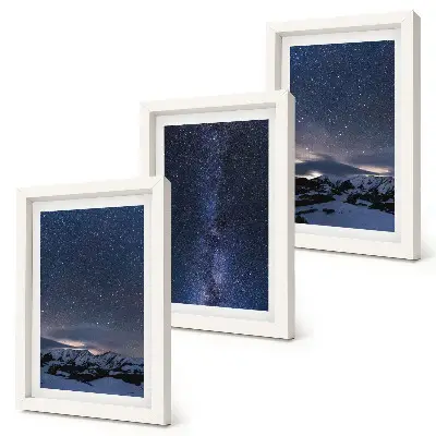 Bilderwand mit Motiv von einem Nachthimmel mit Sternen und einer Berglandschaft