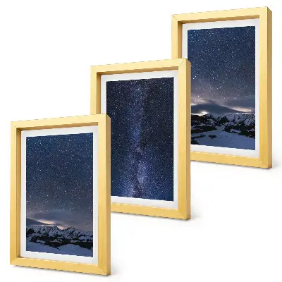 Bilderwand mit Motiv von einem Nachthimmel mit Sternen und einer Berglandschaft