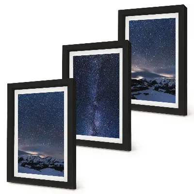 Bilderwand mit Motiv von einem Nachthimmel mit Sternen und einer Berglandschaft