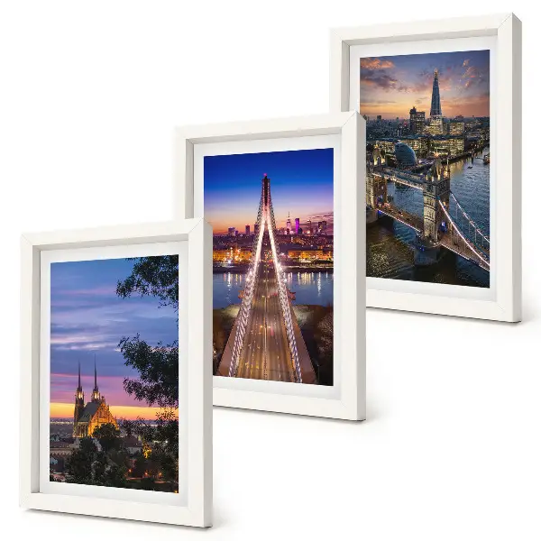 Bilderwand mit Stadtansichten von Brücken bei Sonnenuntergang