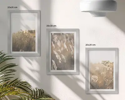 Fotowand Landschaft mit Gräsern und Blumen in warmen Farbtönen