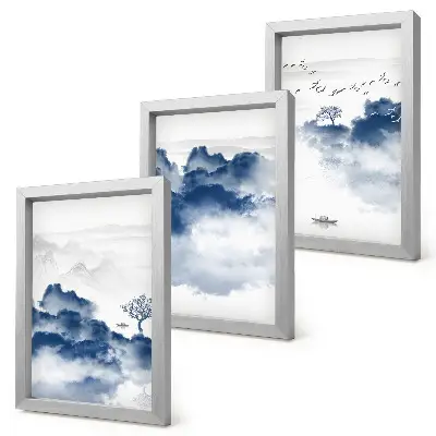 Fotowand mit Wolkenbergen, Bäumen und Vögeln im Hintergrund
