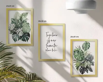 Bilderwand mit Motiv grüner tropischer Blätter und dekorativer Inschrift