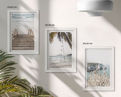 Bilderwand Strand mit Holztreppe und einer Schaukel am Meer