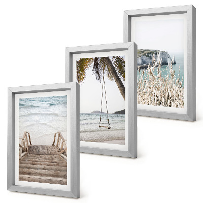 Bilderwand Strand mit Holztreppe und einer Schaukel am Meer