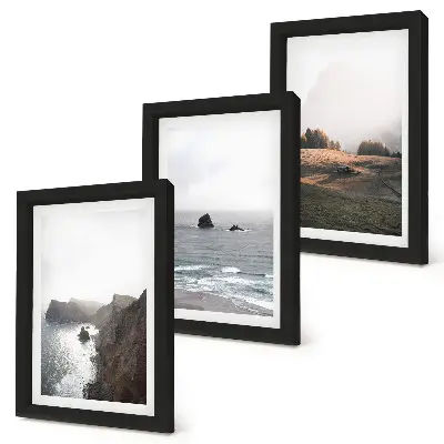 Bilderwand mit Berg- und Meereslandschaften sowie Wolken und Wäldern