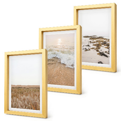 Bilderwand Strand mit Wellen und Kieselsteinen im Sommer