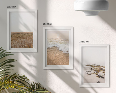 Bilderwand Strand mit Wellen und Kieselsteinen im Sommer