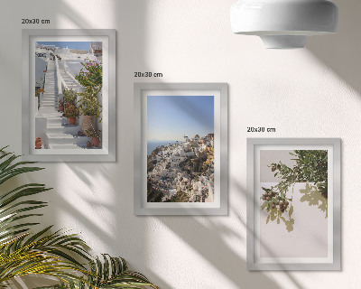 Bilderwand Weiße Treppe in Santorini mit Blick auf die Stadt