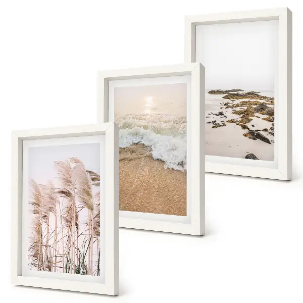 Bilderset mit Rahmen Strandgras, Wellen und Kieselsteine am Meer im Boho-Stil