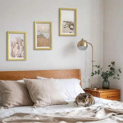 Bilderset mit Rahmen Strandgras, Wellen und Kieselsteine am Meer im Boho-Stil