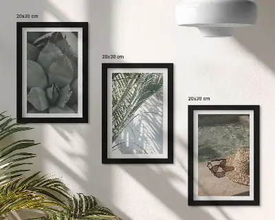 Bilderwand mit tropischen Pflanzen und sommerlichen Urlaubsakzenten