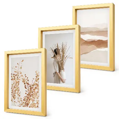 Bilderwand mit Pflanzenmotiven im abstrakten und rustikalen Boho-Stil