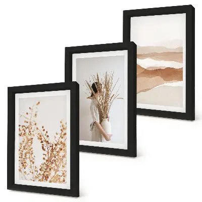 Bilderwand mit Pflanzenmotiven im abstrakten und rustikalen Boho-Stil