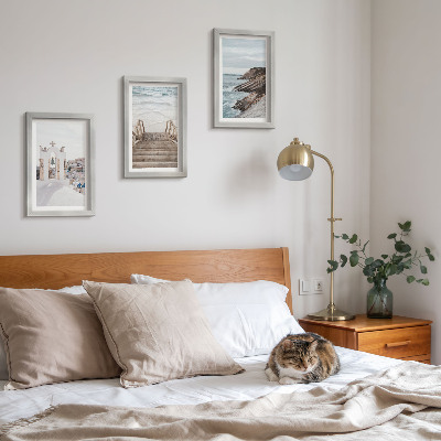 Bilderwand Blick auf das Meer und die Architektur von Santorin vor dem Himmel