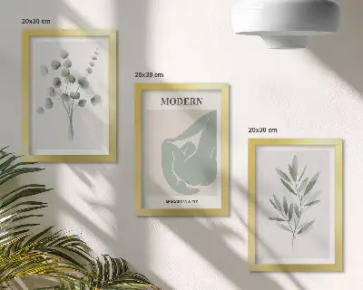 Bilderwand mit Pflanzenmotiven in zarten Grüntönen