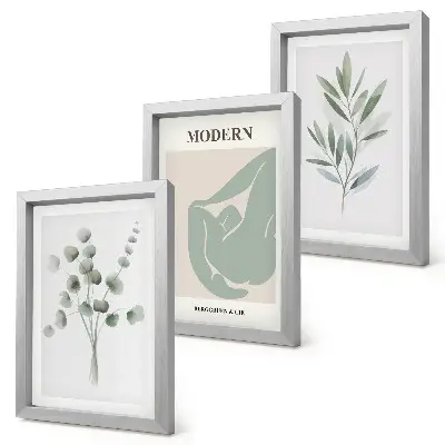 Bilderwand mit Pflanzenmotiven in zarten Grüntönen