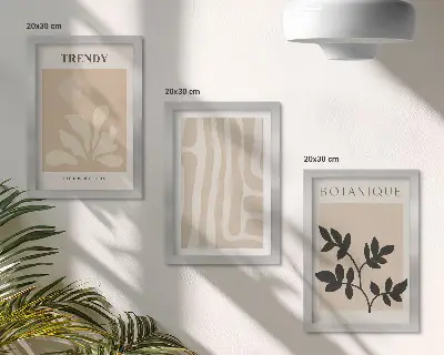 Bilderwand mit stilvollen Pflanzenmustern in Beige- und Schwarztönen