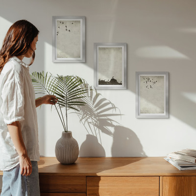 Bilderwand Fliegende Vogelschar im minimalistischen Stil