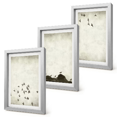 Bilderset mit rahmen Vögel im Flug, gemalt im minimalistischen Stil