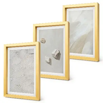 Bilderwand mit Sand, Steinen und modernen Farbstrukturen